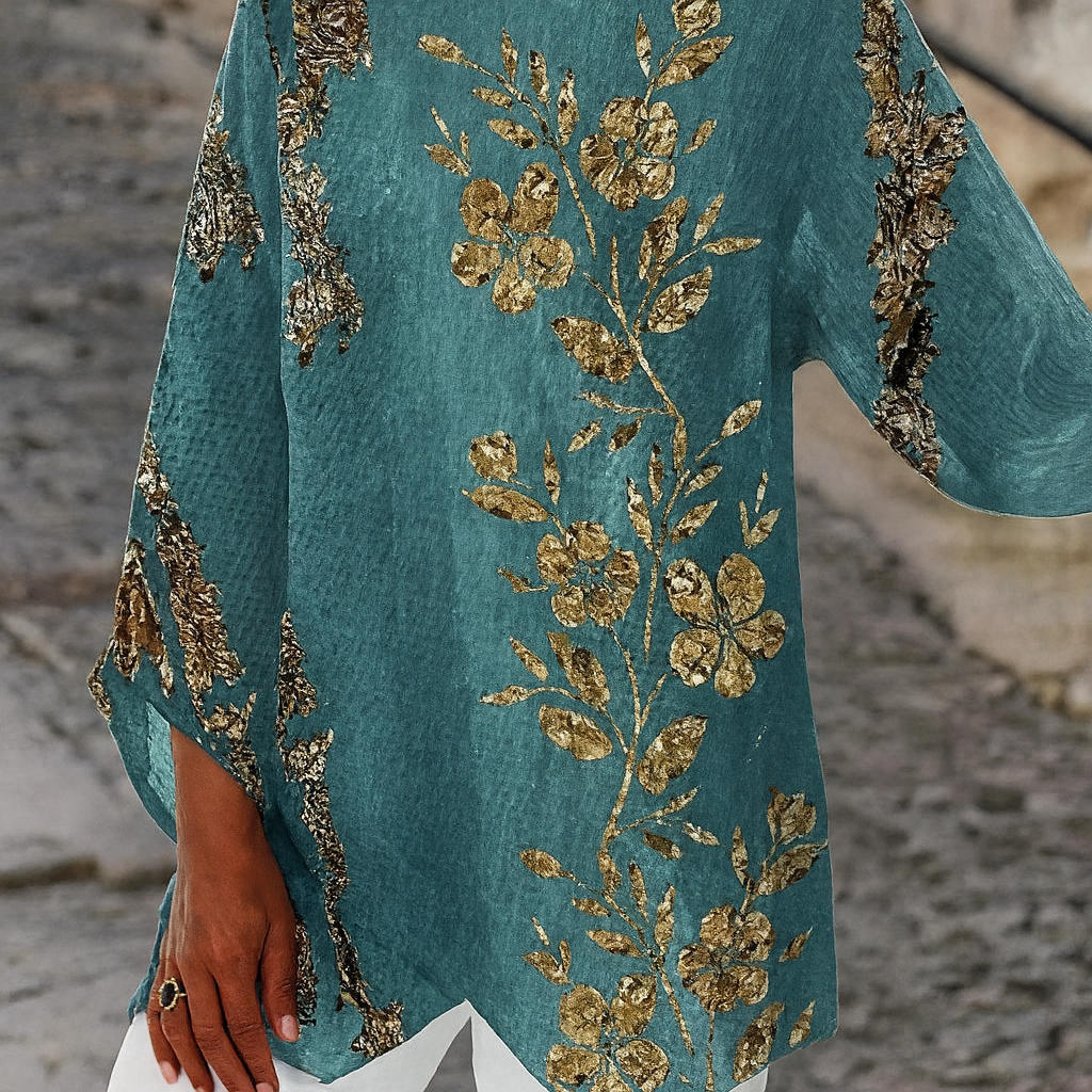 Gouden blouse met lange mouwen en bloemenprint