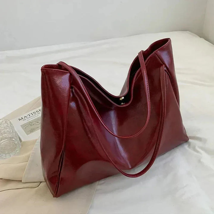https://cdn.shopify.com/s/files/1/0836/3265/2620/files/0-main-women-tote-bag-fashion-underarm-pouch-large-capacity-soft-pu-leather-shoulder-bag-retro-crossbody-bag-casual-portable-bucketbags.webp?v=1752645254