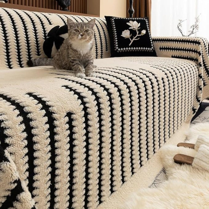 Decoratieve gecapitonneerde bankplaid met gezellige textuur