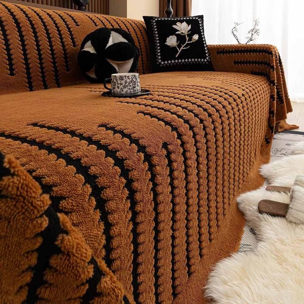 Decoratieve gecapitonneerde bankplaid met gezellige textuur