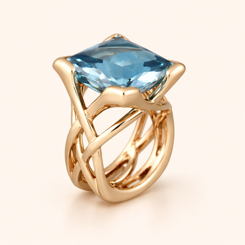 Elegante roségouden ring met blauwe zirkonia