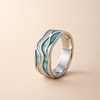 Golvende ring van wit goud