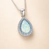Sprankelende blauwe opal ketting in wit goud