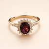 Elegante gouden ring met rode zirkonia