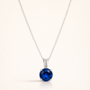 Elegante witgouden ketting met ronde geslepen saffier