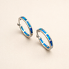 Elegante zilveren oorbellen met opaal in oceaanstijl