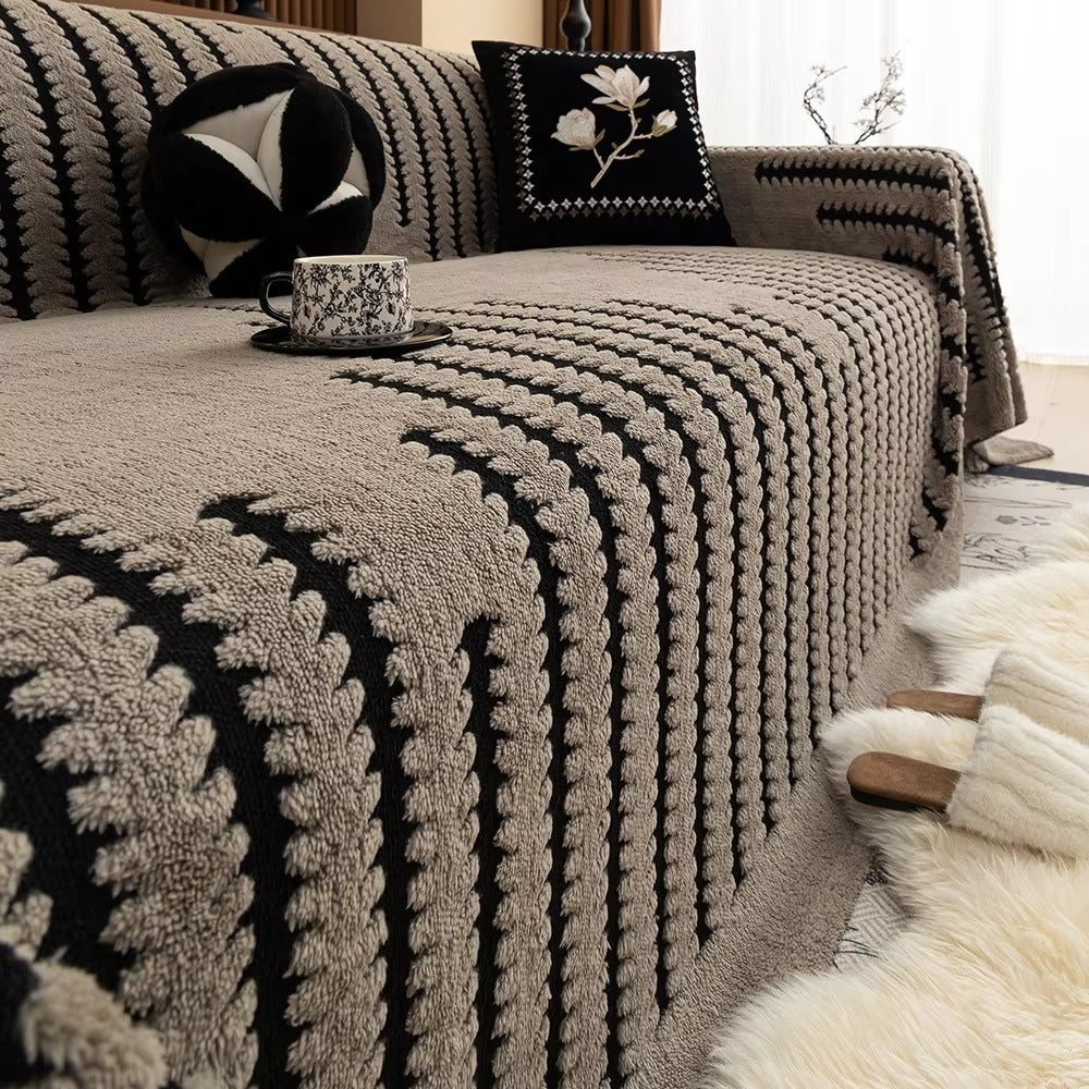 Decoratieve gecapitonneerde bankplaid met gezellige textuur