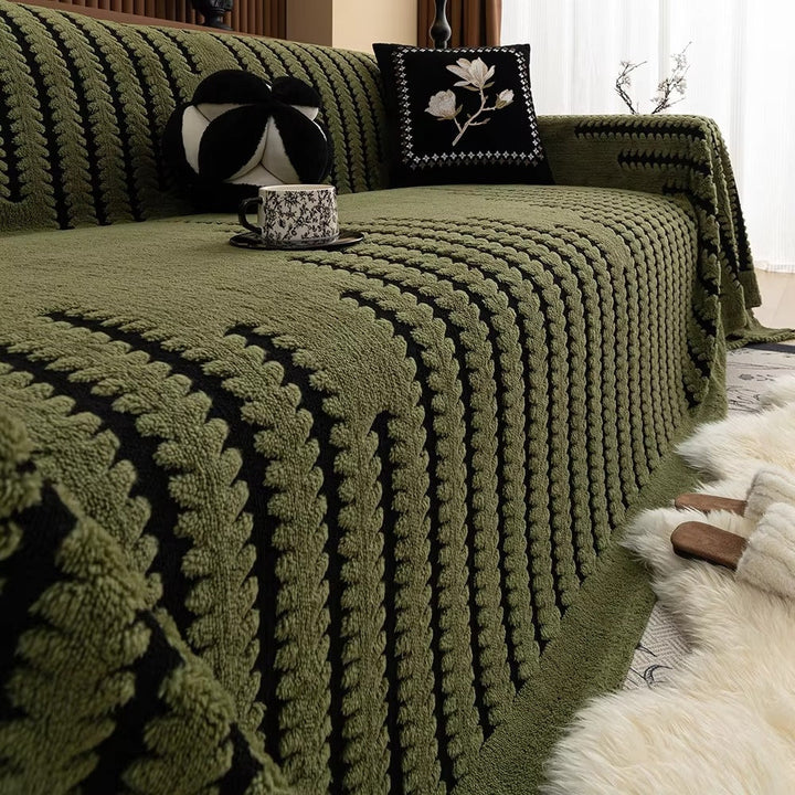 Decoratieve gecapitonneerde bankplaid met gezellige textuur