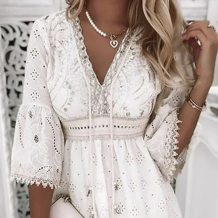 Naiara – Luchtige Boho Zomerjurk met Borduursel en Flare Mouwen