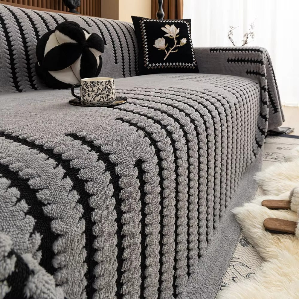 Decoratieve gecapitonneerde bankplaid met gezellige textuur