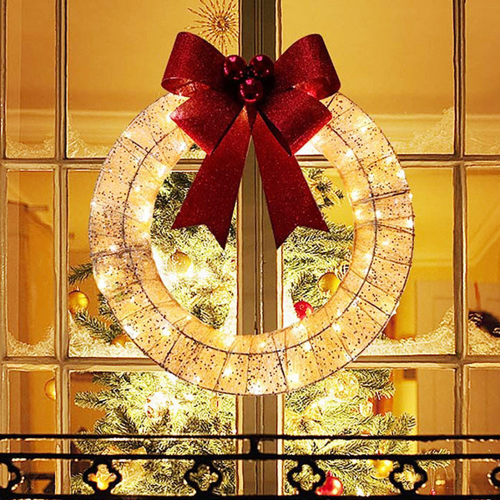 Kerstkrans met verlichting en grote rode strik, 50 cm