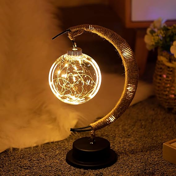 Decoratieve tafellamp met sfeervolle maangloed