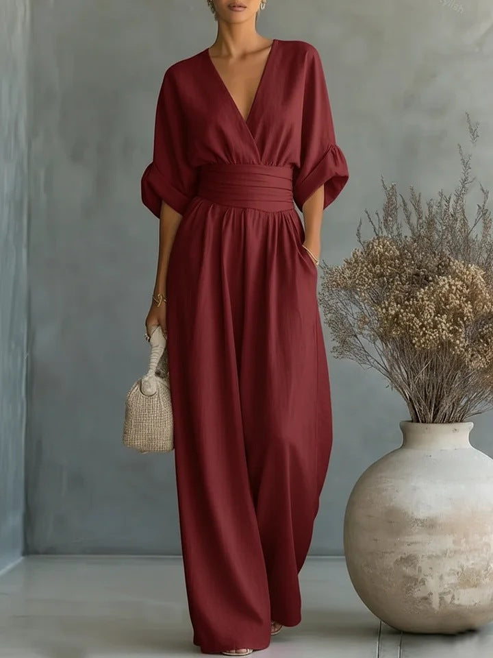 Elegante damesjumpsuit met wijde pijpen, V-hals en vloeiende pasvorm