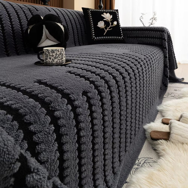 Decoratieve gecapitonneerde bankplaid met gezellige textuur