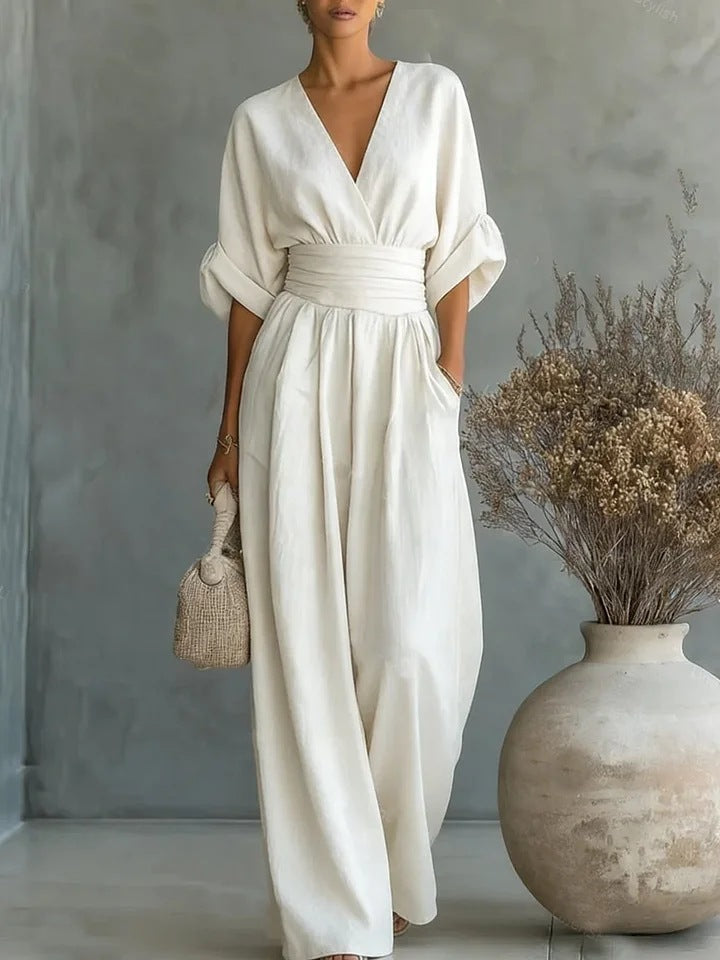 Elegante damesjumpsuit met wijde pijpen, V-hals en vloeiende pasvorm
