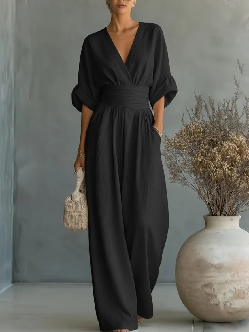 Elegante damesjumpsuit met V-hals en wijd uitlopende pijpen met hoge taille