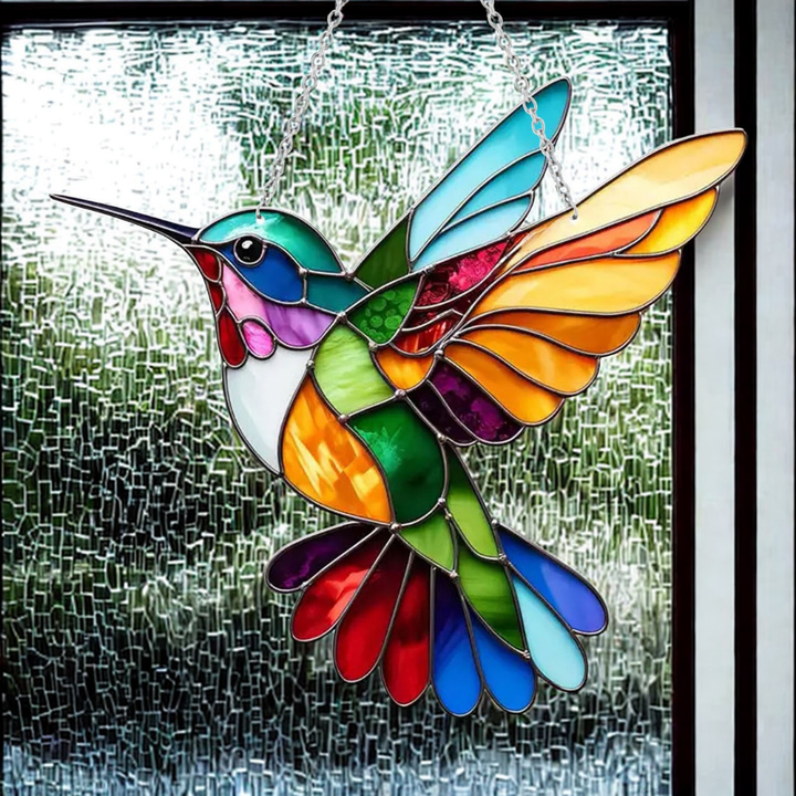 Raamdecoratie met blauwe vogel om op te hangen als zonnevanger