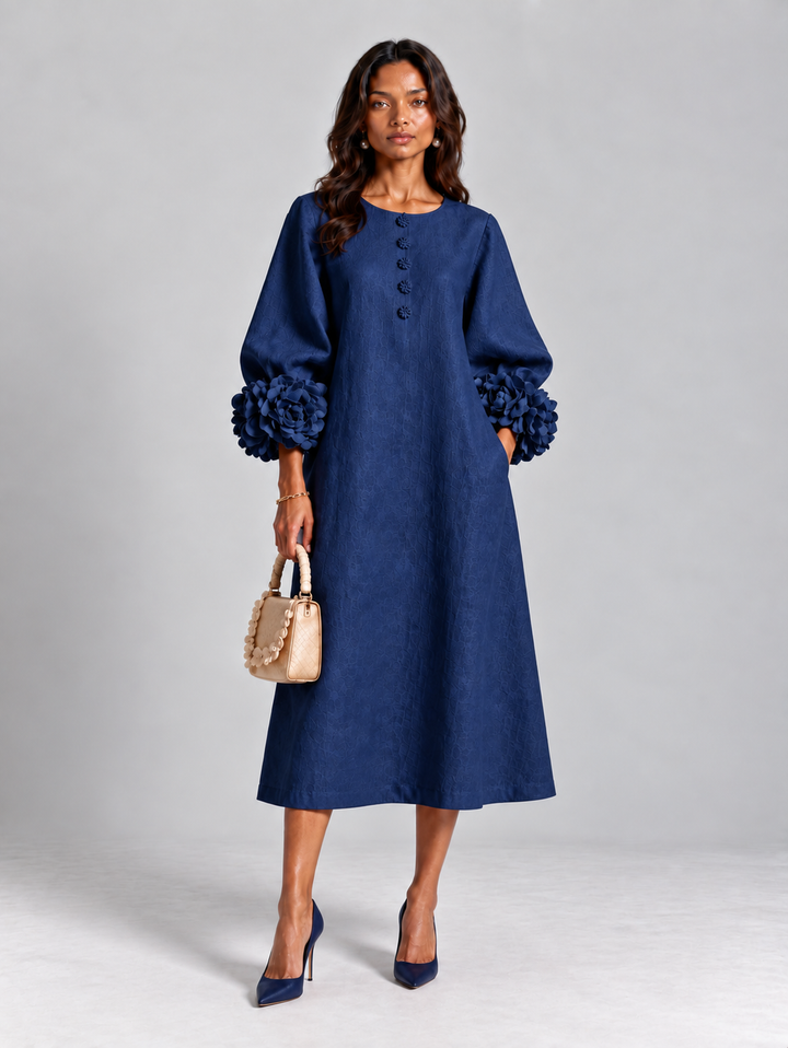 Elegante, lange, vloeiende jurk met ballonmouwen