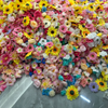 Kunstbloemenslinger met 100 stuks