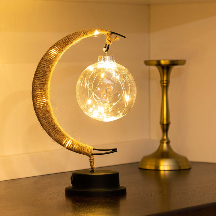 Decoratieve tafellamp met sfeervolle maangloed
