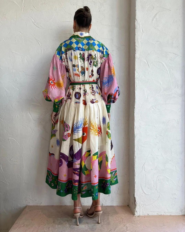 Uitlopende midi-jurk met een all-over grafische print - Lela