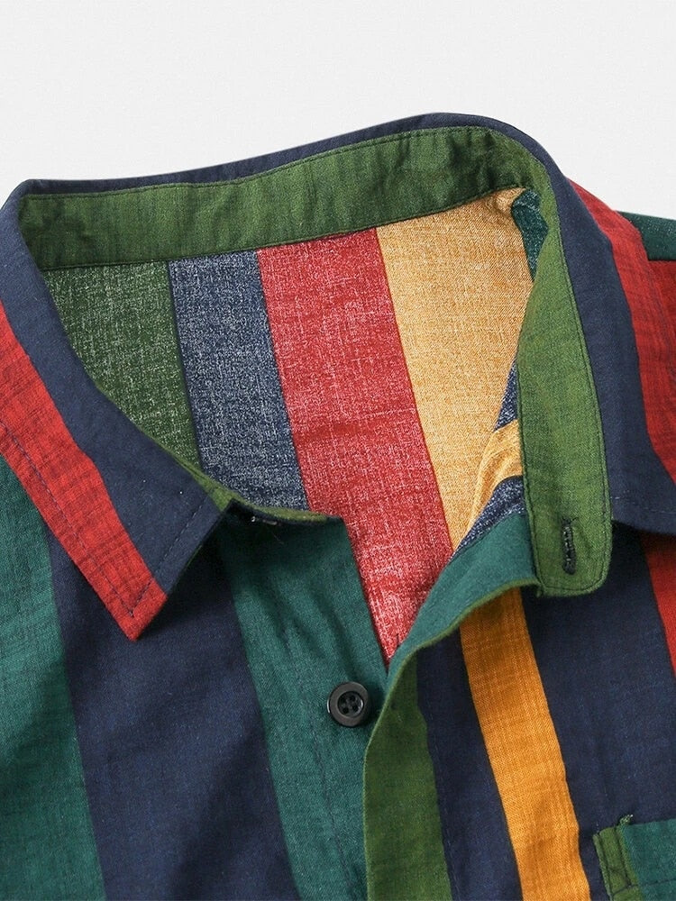 Gestreept overhemd met kleurrijke verticale banen in rood, groen, geel en blauw. Perfect voor casual mode en zomerse outfits. 100% katoen.