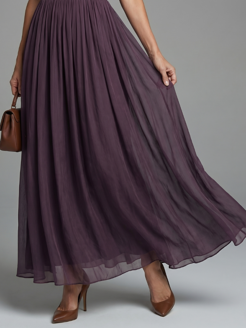 Maxi-jurk voor dames met geplisseerde taille en doorschijnende mouwen