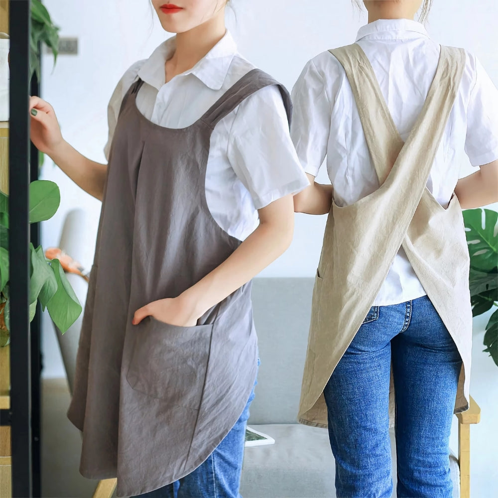 Minimalistische schortjurk met comfortabele gekruiste rug en zakken