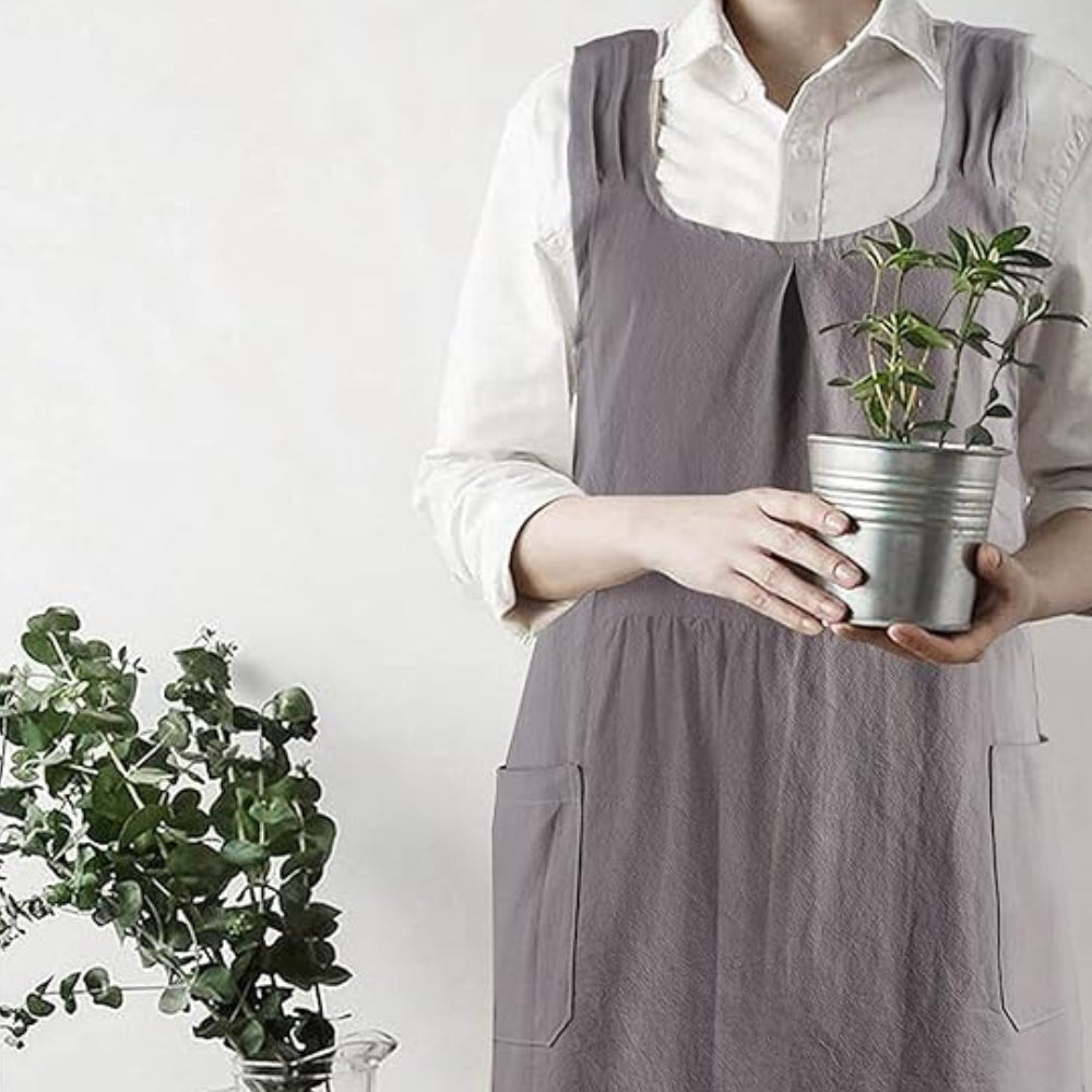 Minimalistische schortjurk met comfortabele gekruiste rug en zakken
