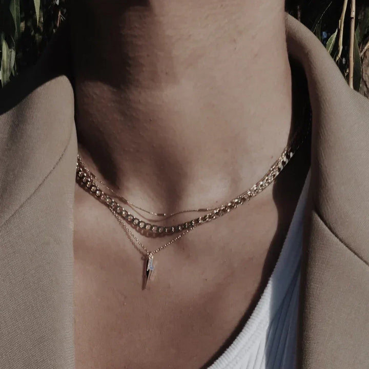 Elegante platte schakel ketting in wit goud