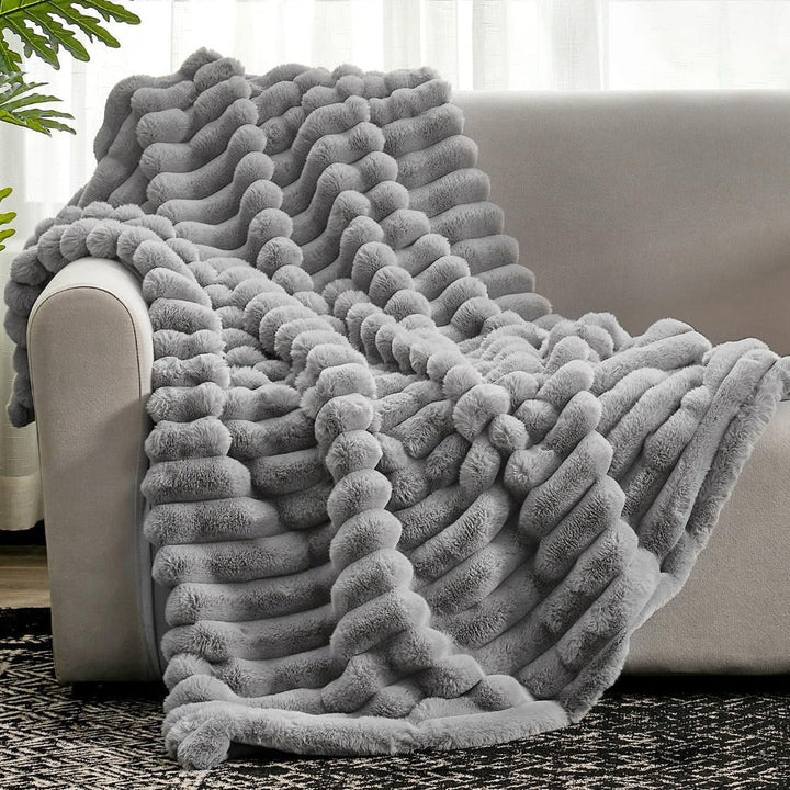 Luxe geribbelde plaid, zacht en comfortabel in huis voor alle vier de seizoenen