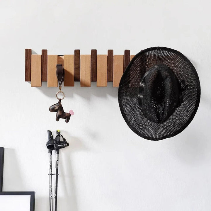 Pianostijl wandkapstok met opklapbare haken