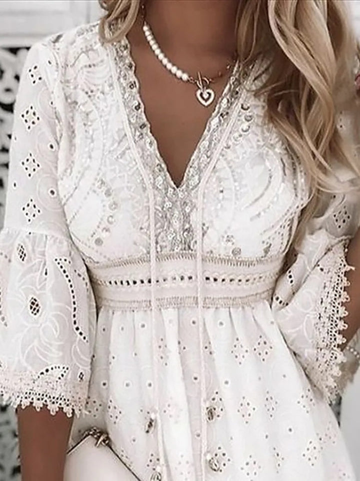 Naiara – Luchtige Boho Zomerjurk met Borduursel en Flare Mouwen