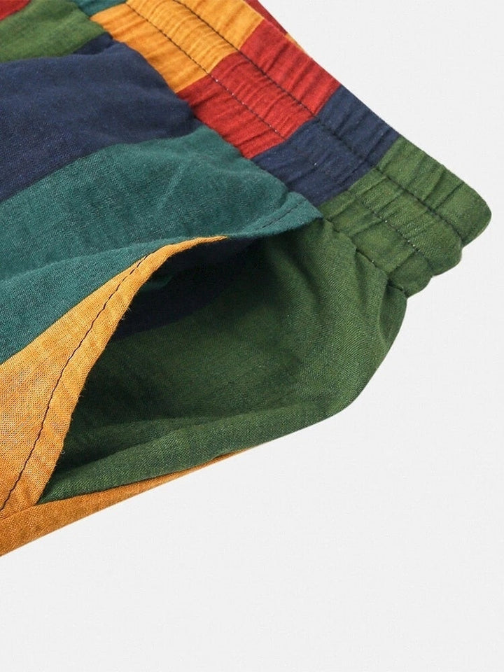 Kleurrijke gestreepte katoenen short met elastische tailleband, ideaal voor zomermode. Comfortabele pasvorm, perfect voor casual wear.