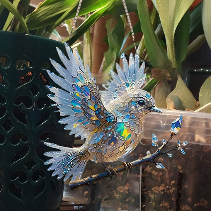 Raamdecoratie met blauwe vogel om op te hangen als zonnevanger