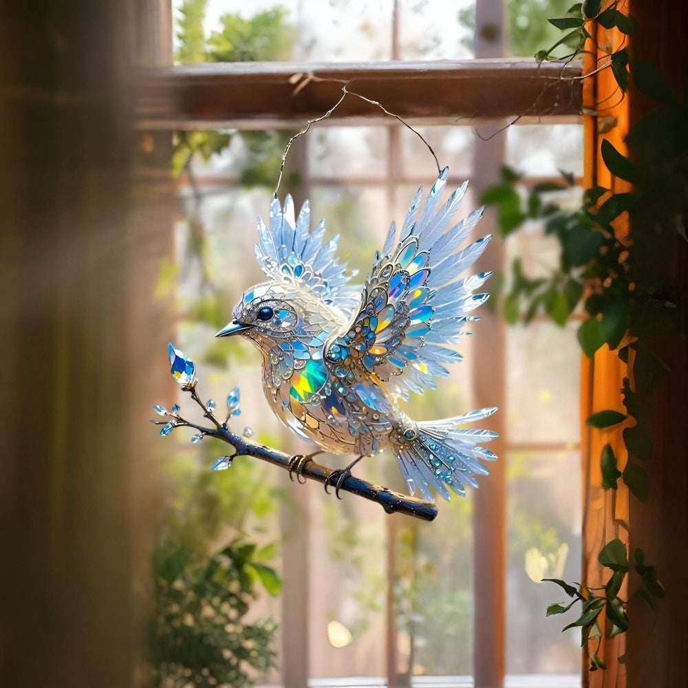 Raamdecoratie met blauwe vogel om op te hangen als zonnevanger