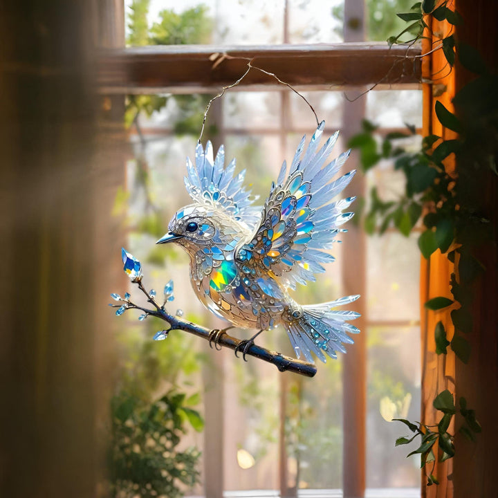 Raamdecoratie met blauwe vogel om op te hangen als zonnevanger