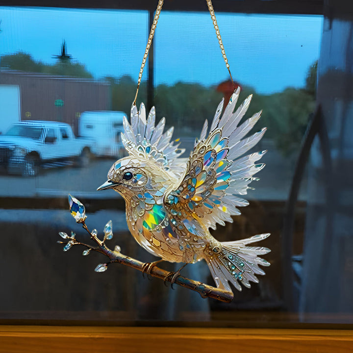 Raamdecoratie met blauwe vogel om op te hangen als zonnevanger