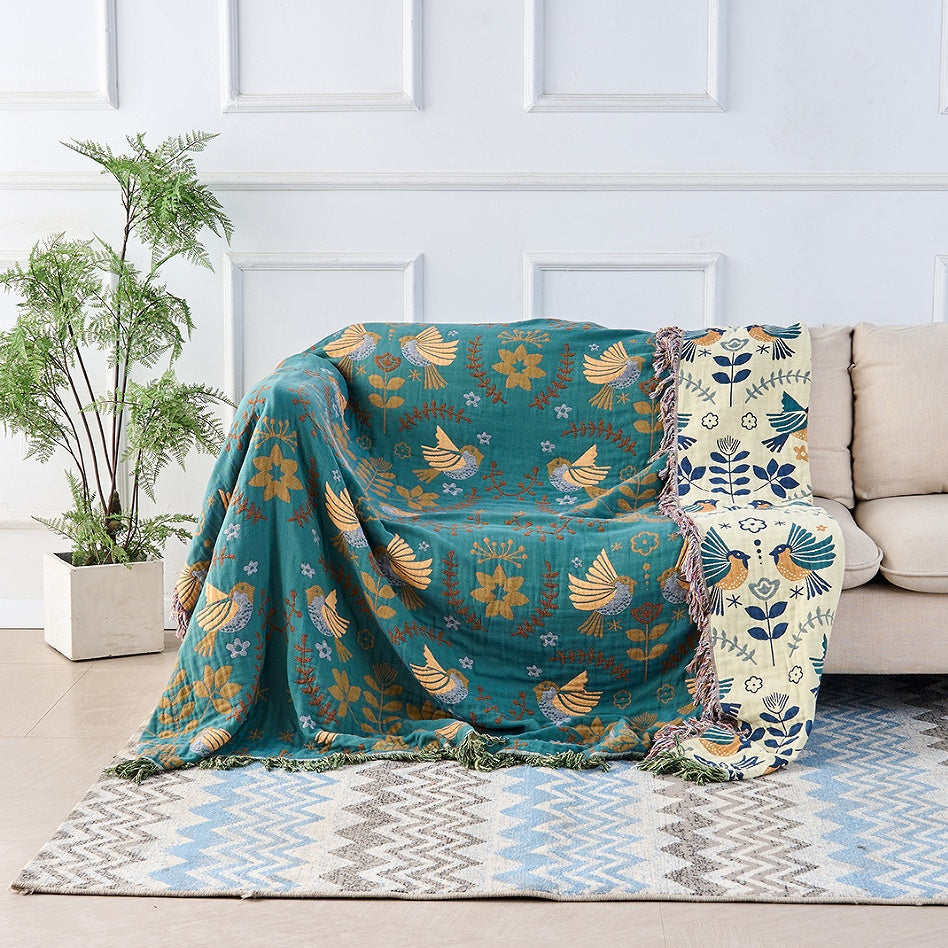 Elegante omkeerbare decoratieve deken in petrol & crème