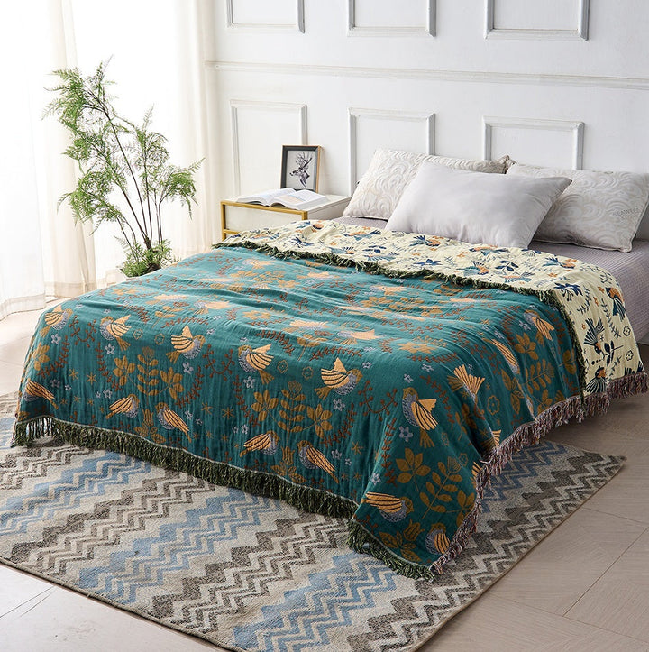 Elegante omkeerbare decoratieve deken in petrol & crème