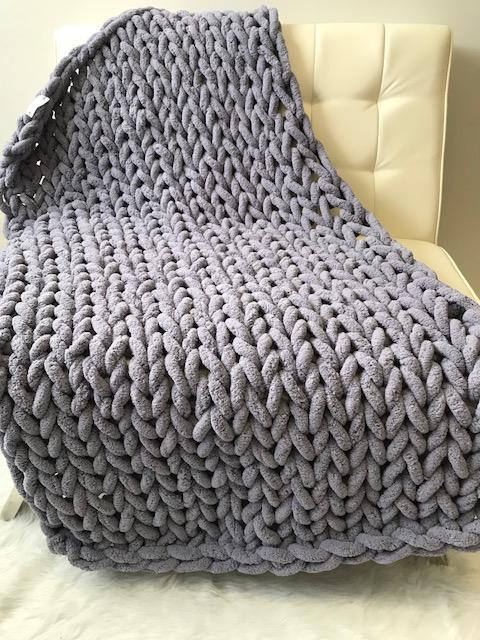 Plaid in grofgebreide stijl, getextureerd wooncomfort
