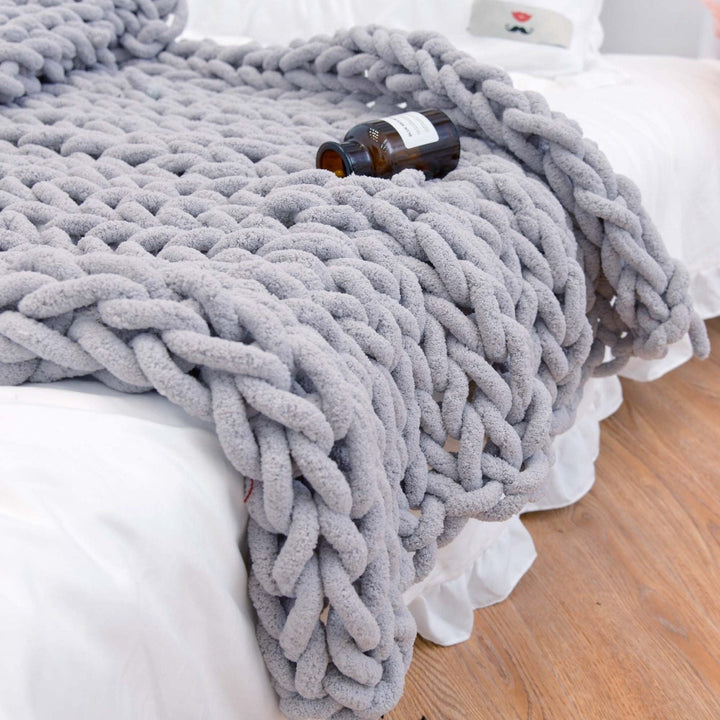 Plaid in grofgebreide stijl, getextureerd wooncomfort