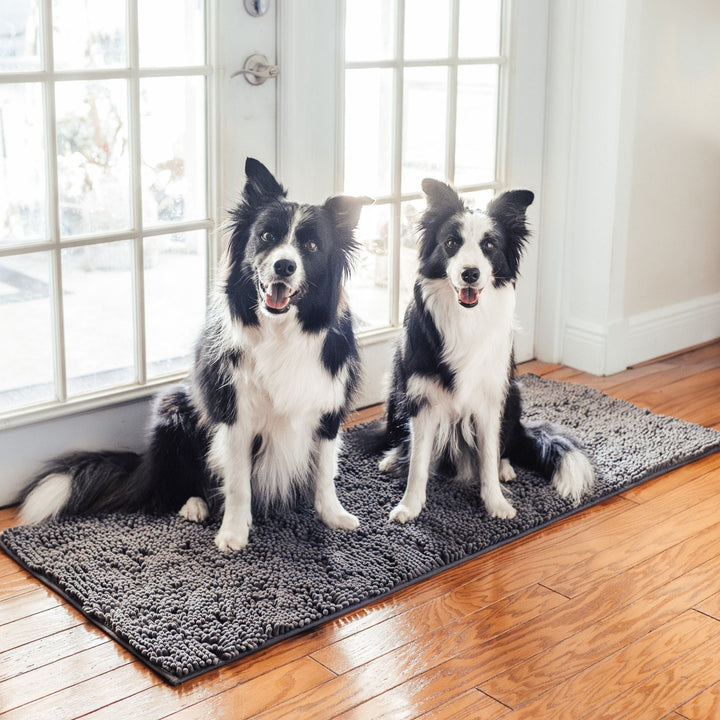 Absorberende antislip deurmat voor honden met vuile poten
