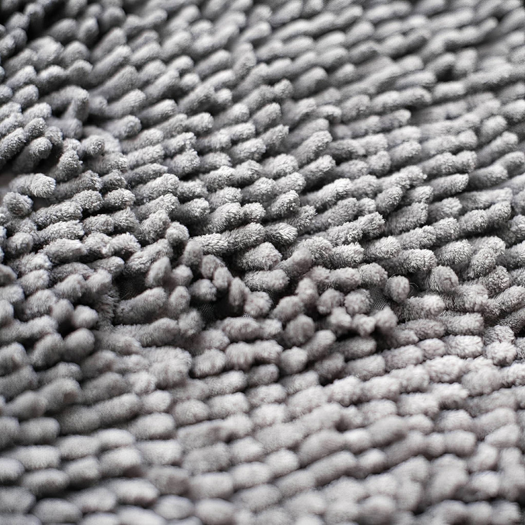 Absorberende antislip deurmat voor honden met vuile poten