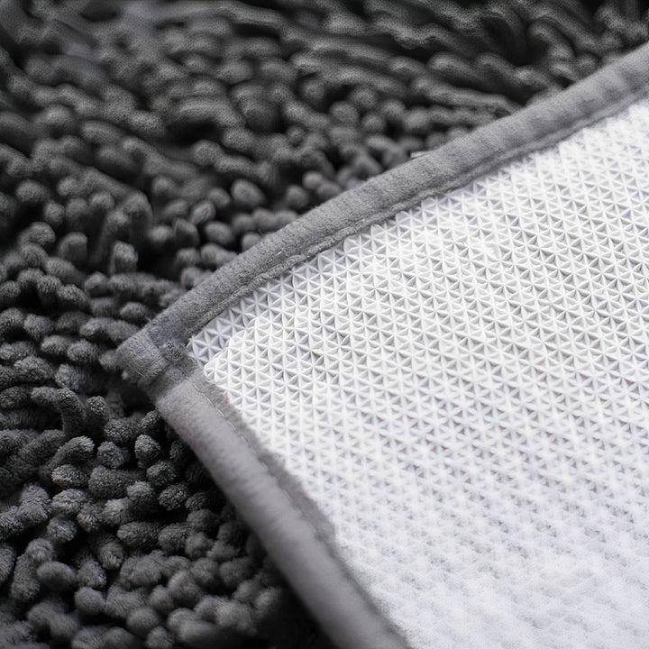 Absorberende antislip deurmat voor honden met vuile poten