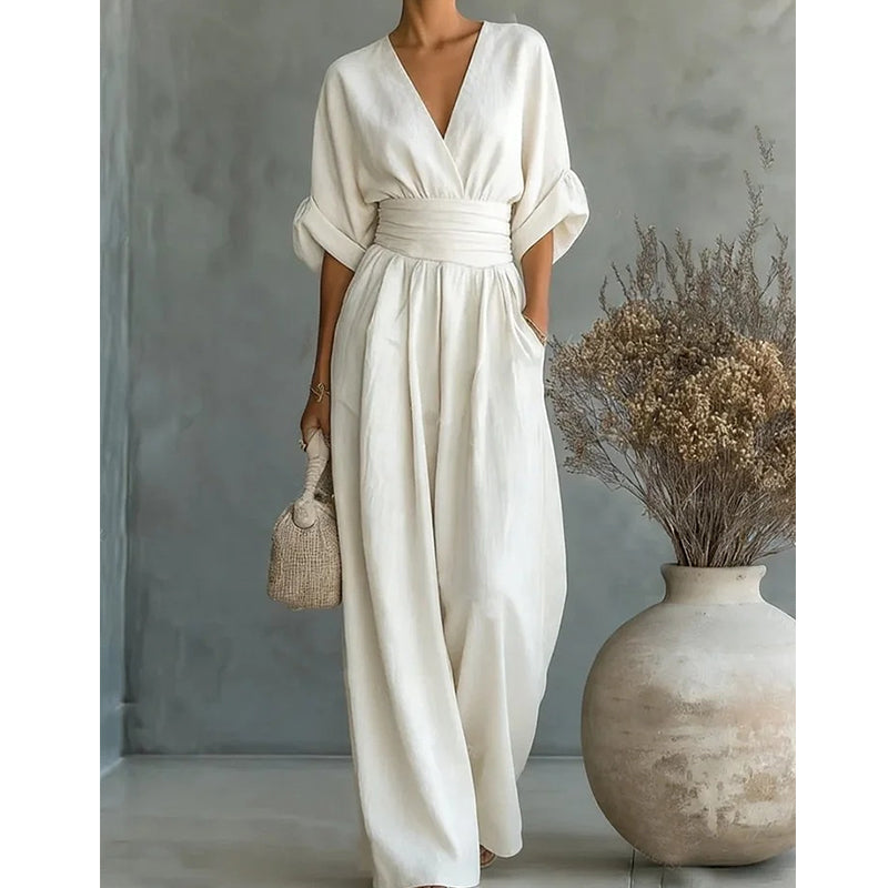 Elegante damesjumpsuit met V-hals en wijd uitlopende pijpen met hoge taille