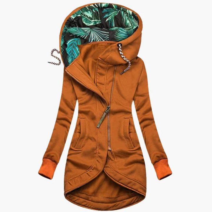 Lange damesjas met asymmetrische rits