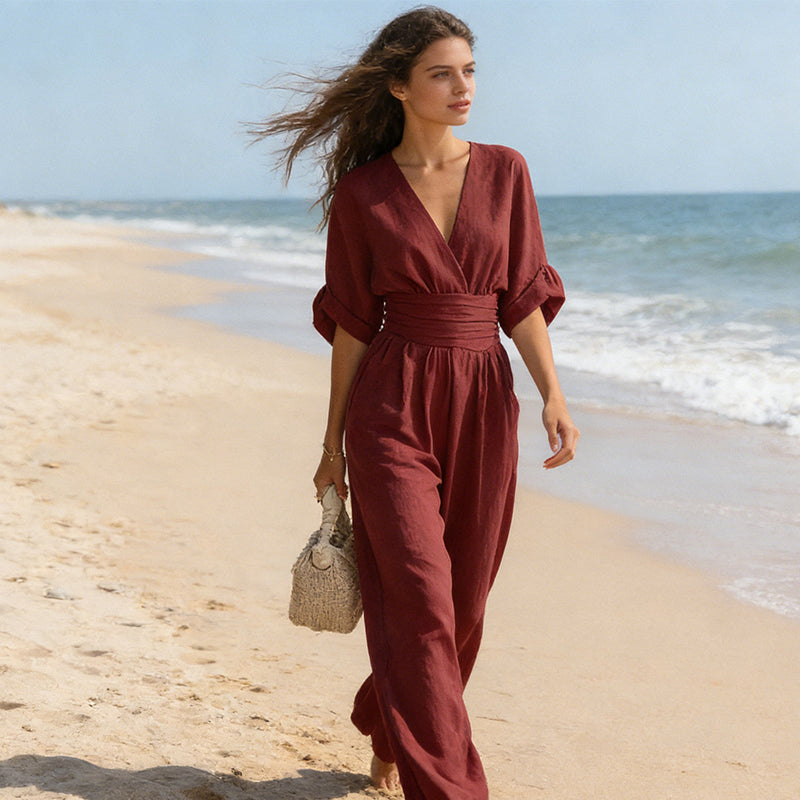 Elegante damesjumpsuit met V-hals en wijd uitlopende pijpen met hoge taille