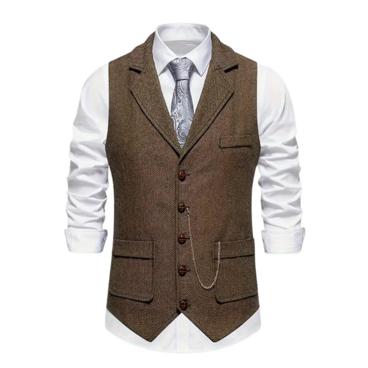 https://cdn.shopify.com/s/files/1/0659/5451/2986/files/heren-vintage-vest-in-visgraat-tweed-klassieke-stijl-met-elegante-revers-perfect-voor-elke-gelegenhe-1.png?v=1753546075