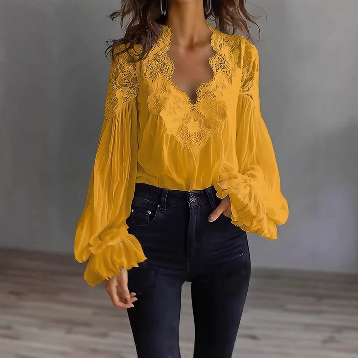 Damesblouse met panelen, ruches, pofmouwen en plooien